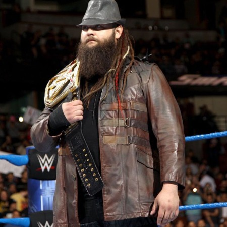Bray Wyatt with his WWE World Heavyweight Championship. 